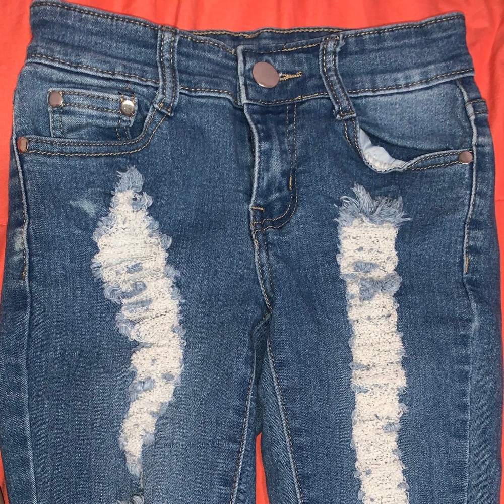 Mid blue ripped jeans